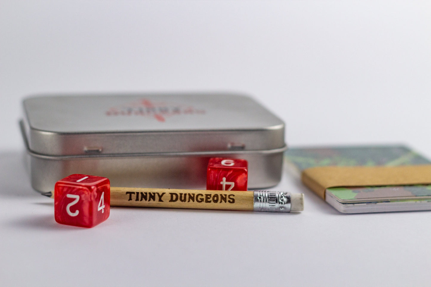 Tinny Dungeons – Minimalist Pocket RPG in a Tin Box – Perfect Travel Companion and Gift