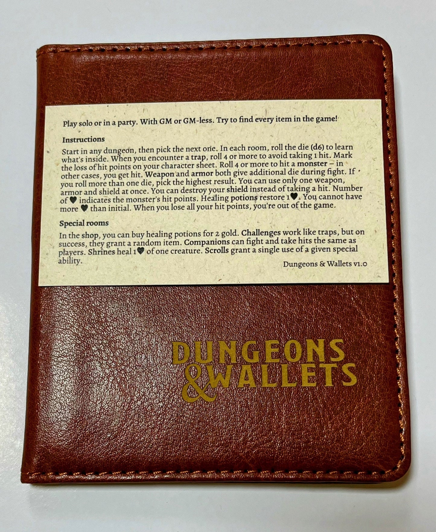 Dungeons & Wallets – Tiny RPG packed in a wallet