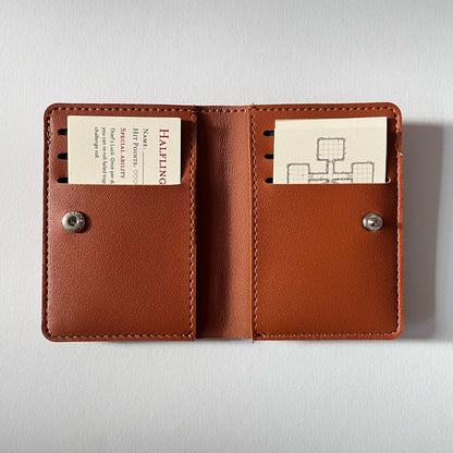 Dungeons & Wallets – Tiny RPG packed in a wallet